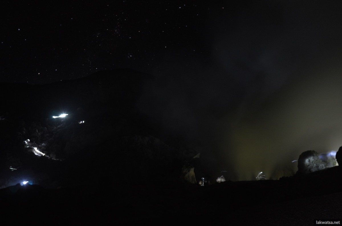 View of the crater rim, the stars, the rime and the blue fire  from the bottom of the crater